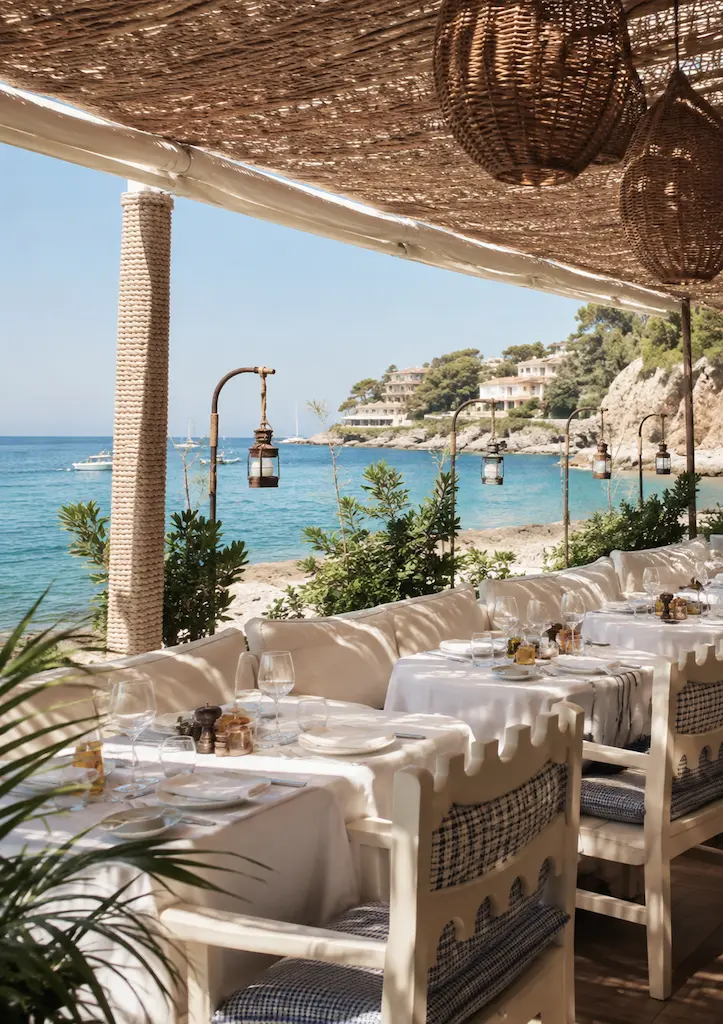 Seaside dining terrace at Loulou Pirate overlooking the Mediterranean in Roquebrune-Cap-Martin on the French Riviera.